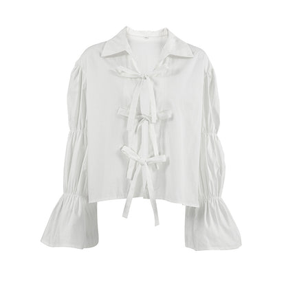 Chemise blanche à liens et manches froncées – Élégance & Féminité
